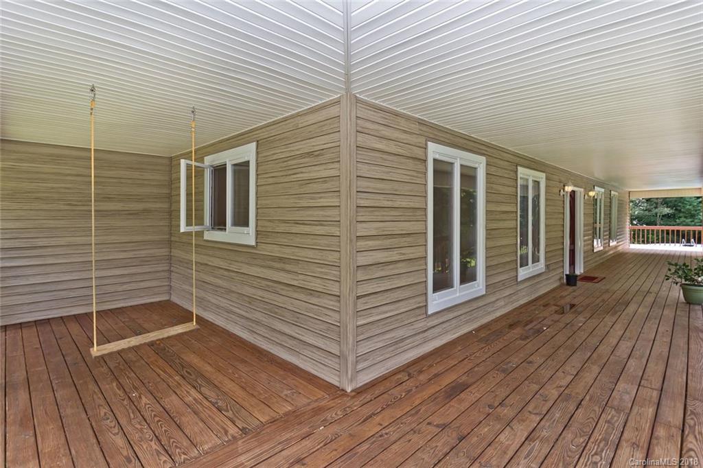 282 Fox Creek Road Mars Hill, NC 28754 - Photo 30 of 36 a view of a balcony with wooden floor