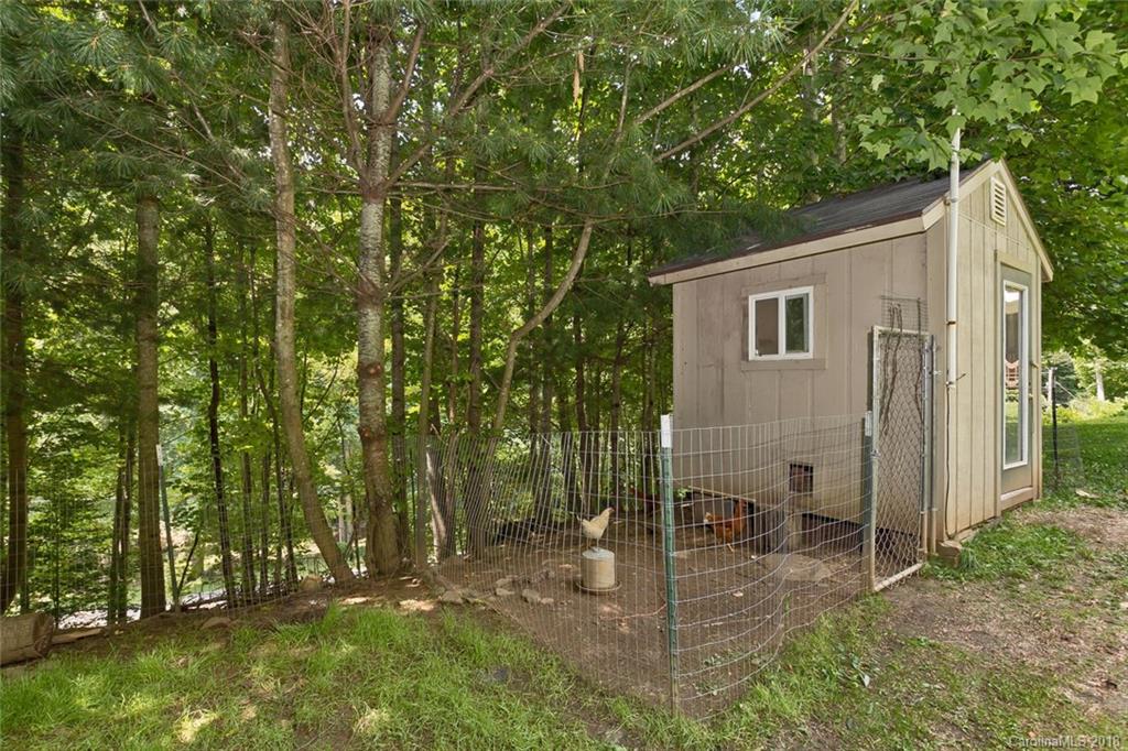 282 Fox Creek Road Mars Hill, NC 28754 - Photo 33 of 36 a view of backyard with a tree