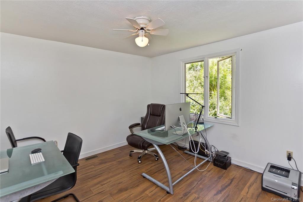 282 Fox Creek Road Mars Hill, NC 28754 - Photo 10 of 36 a view of workspace with wooden floor