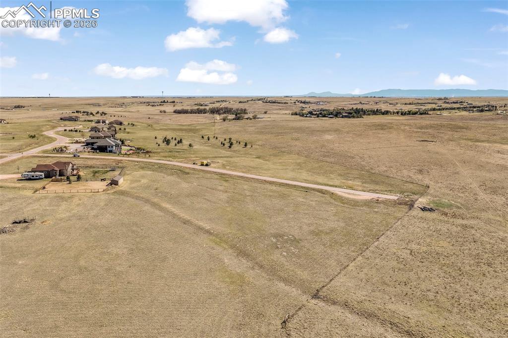 15530 Amo Road Peyton, CO 80831 - Photo 16 of 16 a view of an ocean and beach