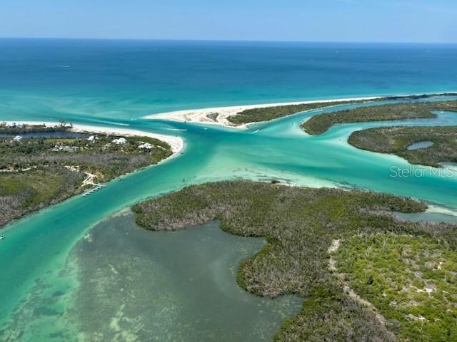 26 Brig Circle North Placida, FL 33946 - Photo 11 of 12 a view of a water with a yard