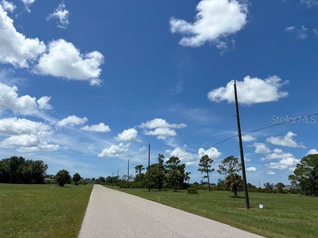 26 Brig Circle North Placida, FL 33946 - Photo 6 of 12 a view of a yard with a fountain