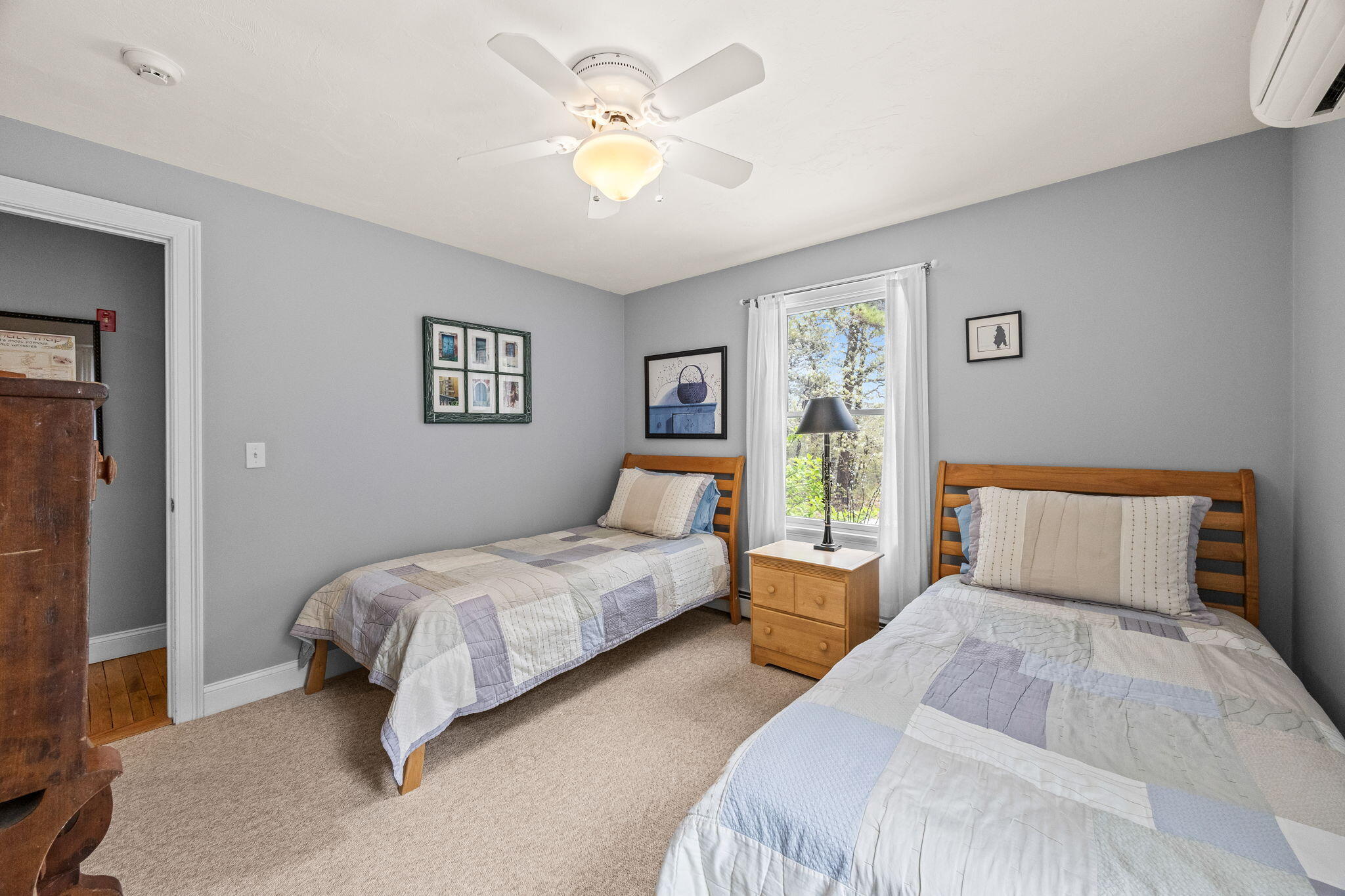 6 Short Lots Lane Truro, MA 02666 - Photo 14 of 63 a bedroom with a bed and a chandelier