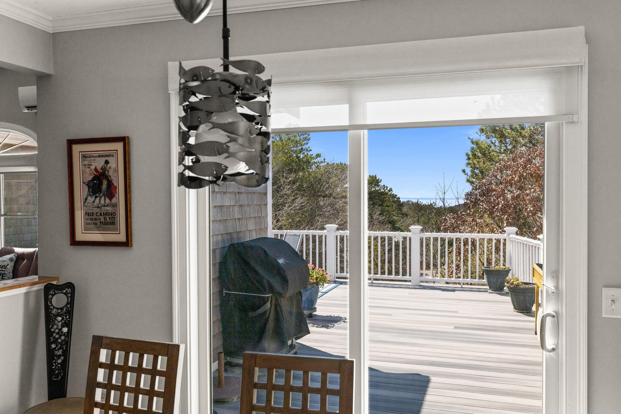 6 Short Lots Lane Truro, MA 02666 - Photo 24 of 63 a view of a balcony with furniture and floor to ceiling window