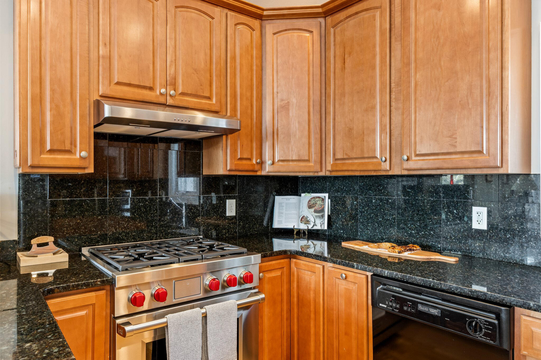 6 Short Lots Lane Truro, MA 02666 - Photo 28 of 63 a kitchen with stainless steel appliances granite countertop a stove a washer and dryer