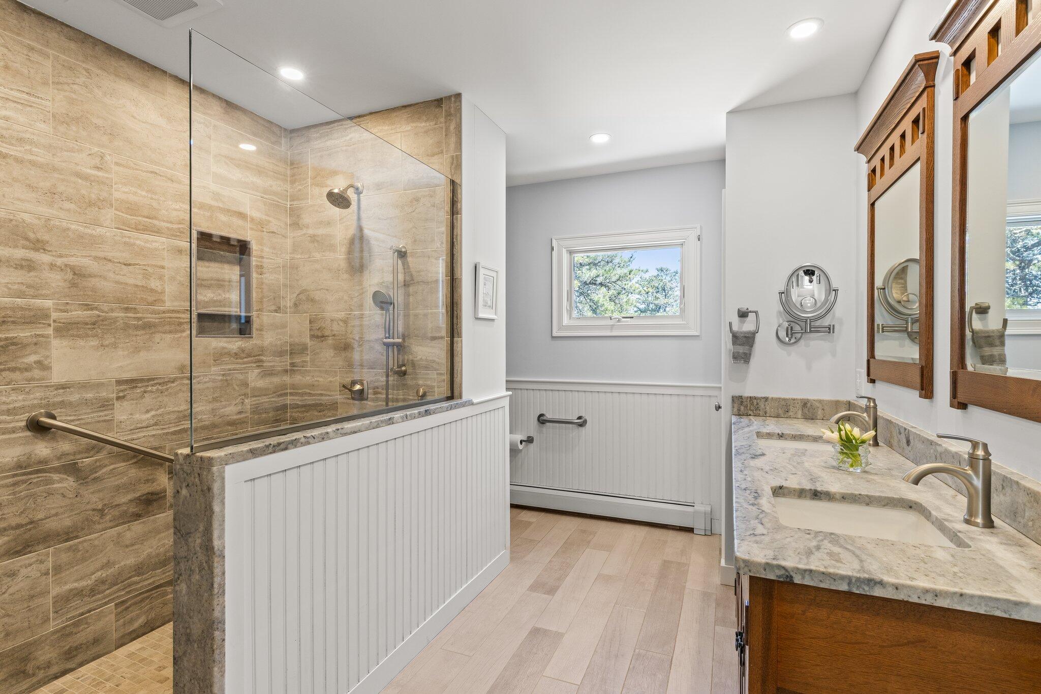6 Short Lots Lane Truro, MA 02666 - Photo 32 of 63 a bathroom with a granite countertop sink a mirror and shower