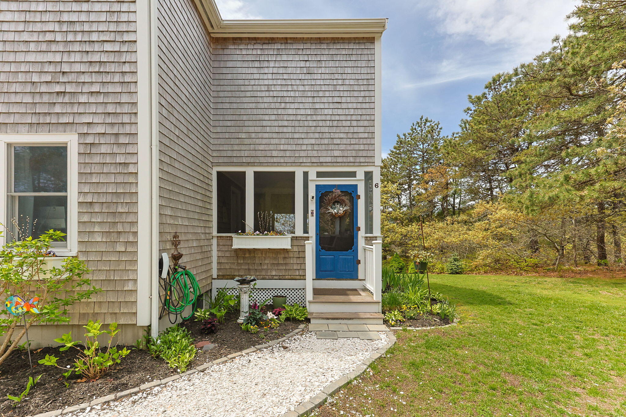 6 Short Lots Lane Truro, MA 02666 - Photo 42 of 63 a view of house with garden and tall tree