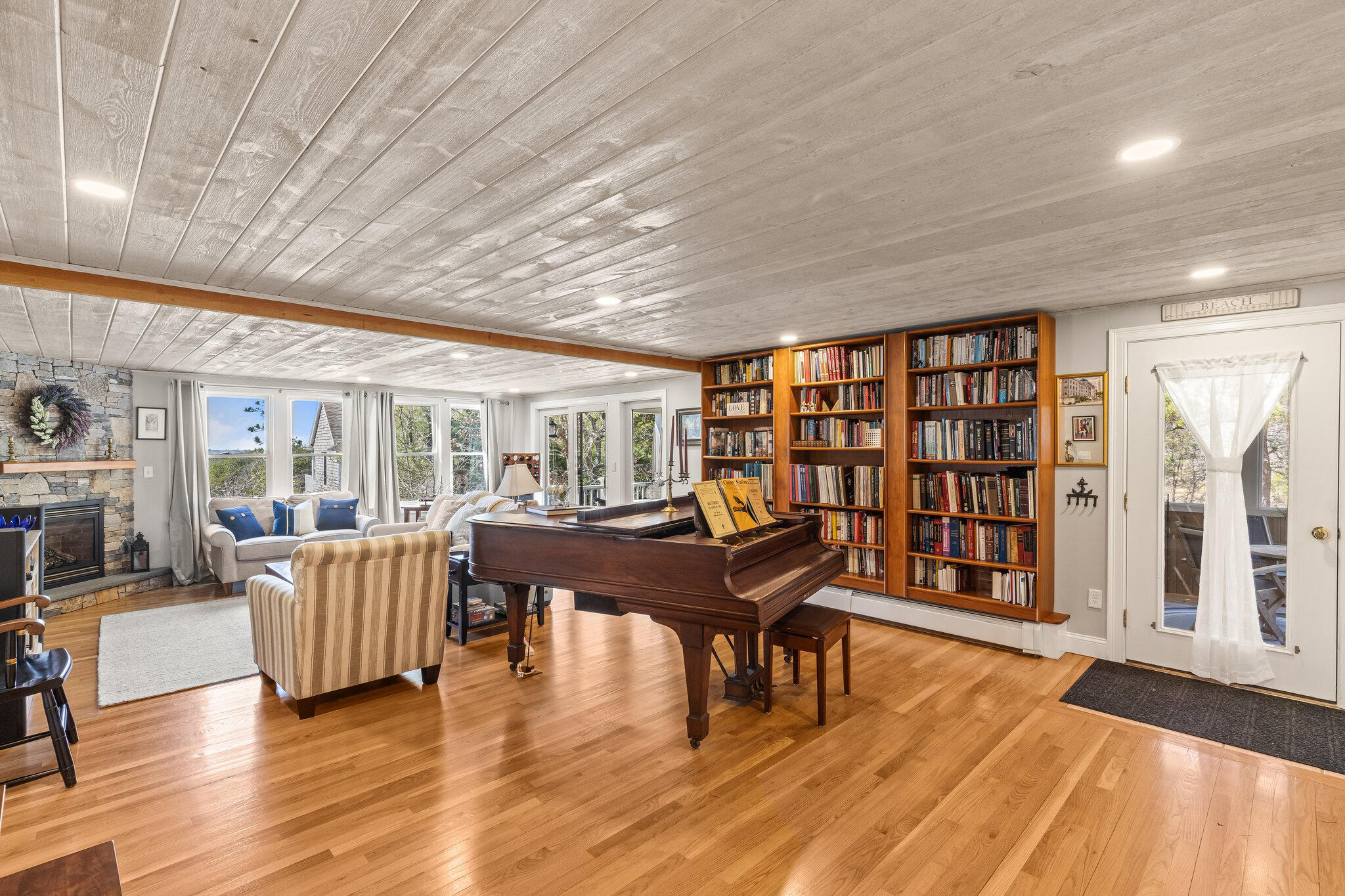 6 Short Lots Lane Truro, MA 02666 - Photo 7 of 63 a living room with furniture and a wooden floor