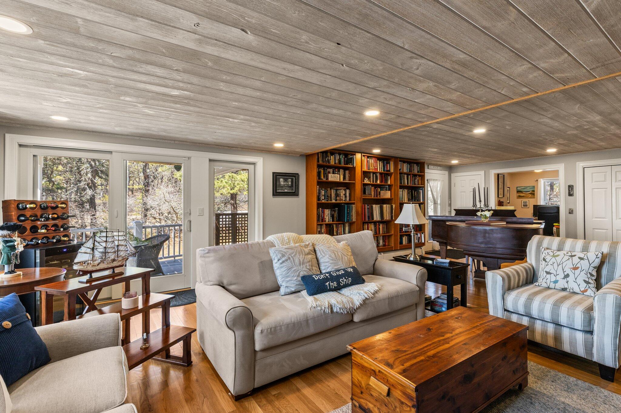 6 Short Lots Lane Truro, MA 02666 - Photo 8 of 63 a living room with furniture and a large window