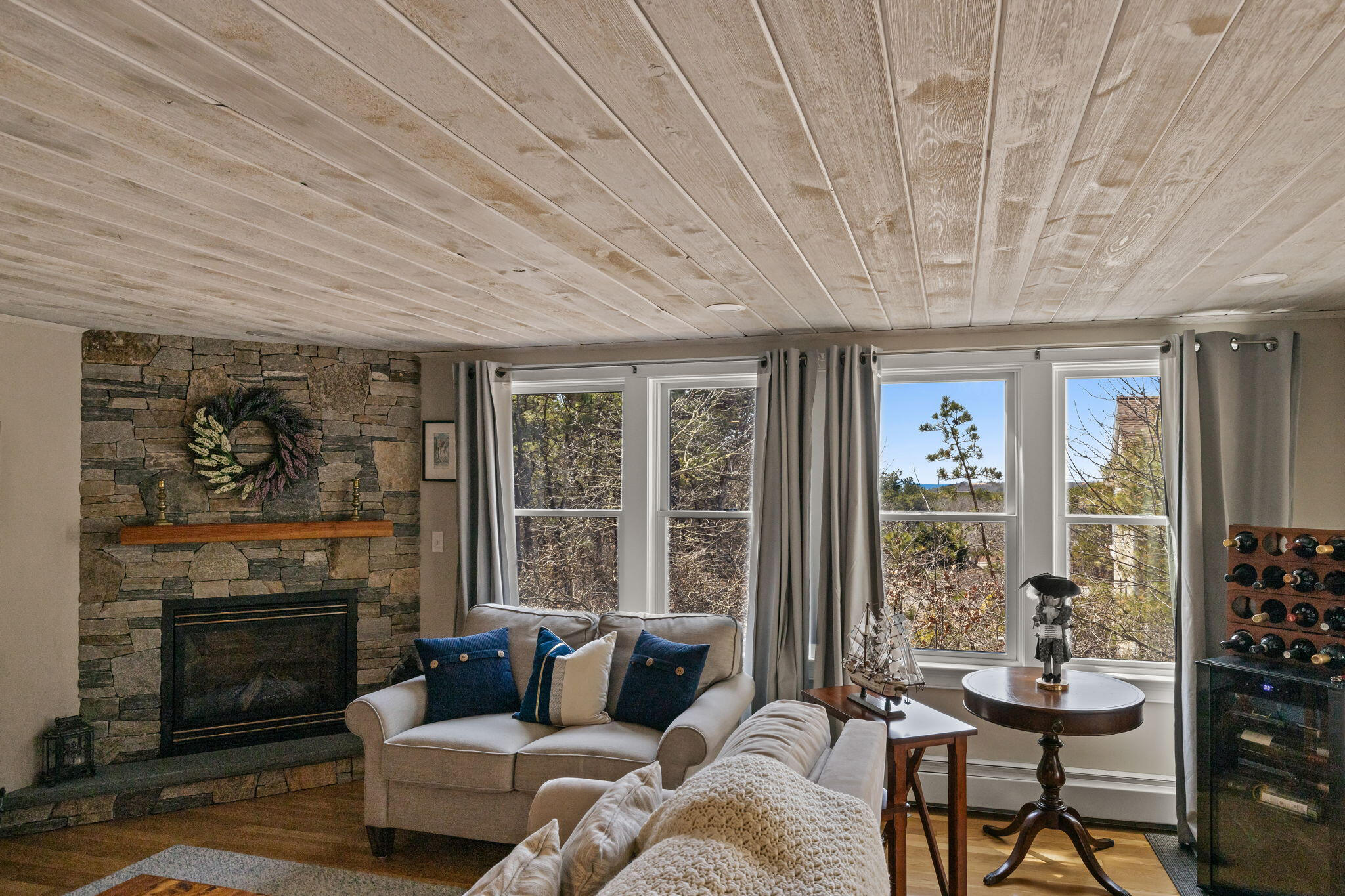 6 Short Lots Lane Truro, MA 02666 - Photo 9 of 63 a living room with furniture and a fireplace