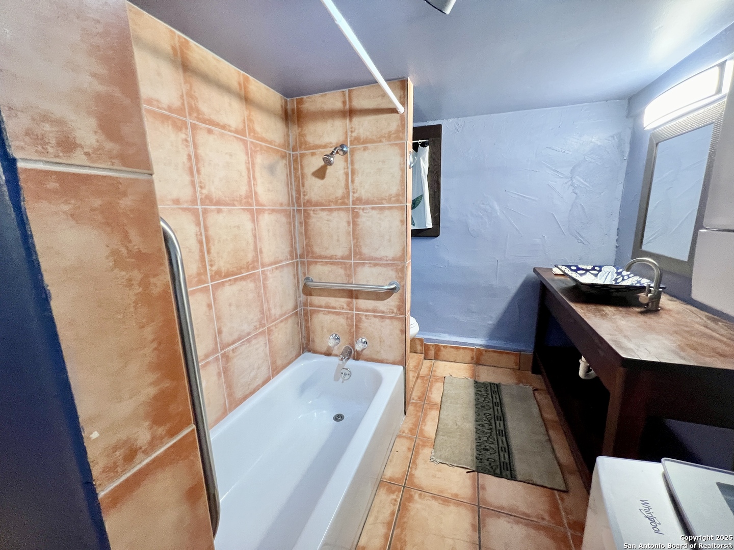 299 Fort Clark Road Brackettville, TX 78832 - Photo 16 of 45 a bathroom with a bathtub and shower