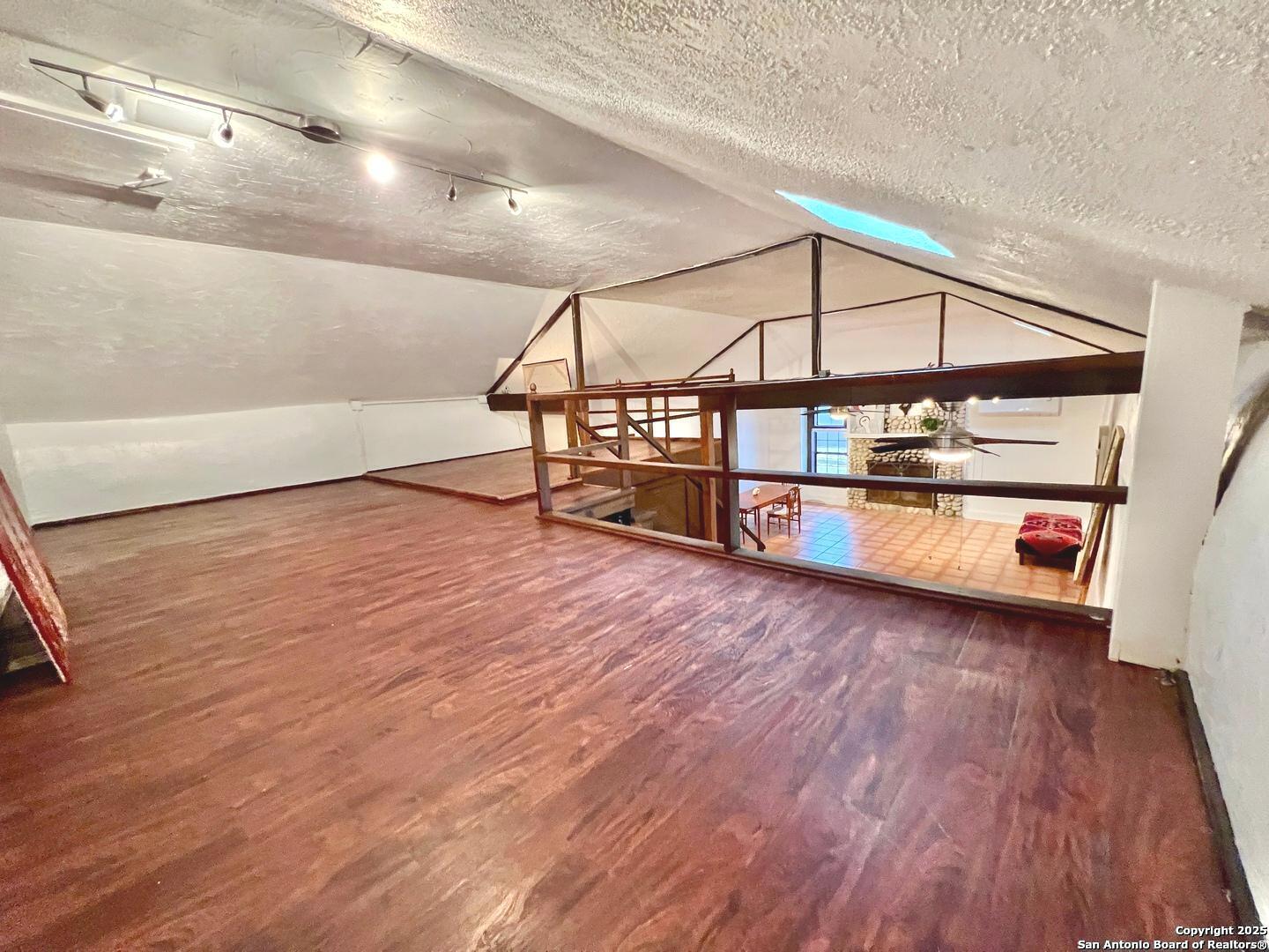 299 Fort Clark Road Brackettville, TX 78832 - Photo 23 of 45 a view of a hardwood and an empty room