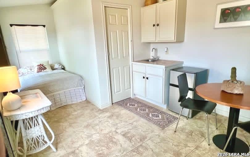 299 Fort Clark Road Brackettville, TX 78832 - Photo 28 of 50 a spacious bathroom with a sink and a mirror