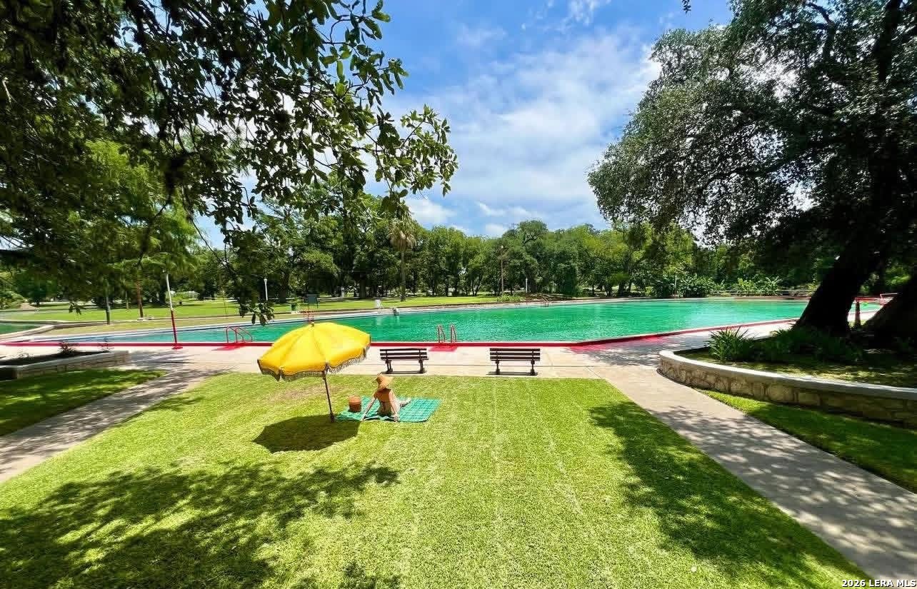 299 Fort Clark Road Brackettville, TX 78832 - Photo 39 of 50 a view of a swimming pool with a backyard and trees