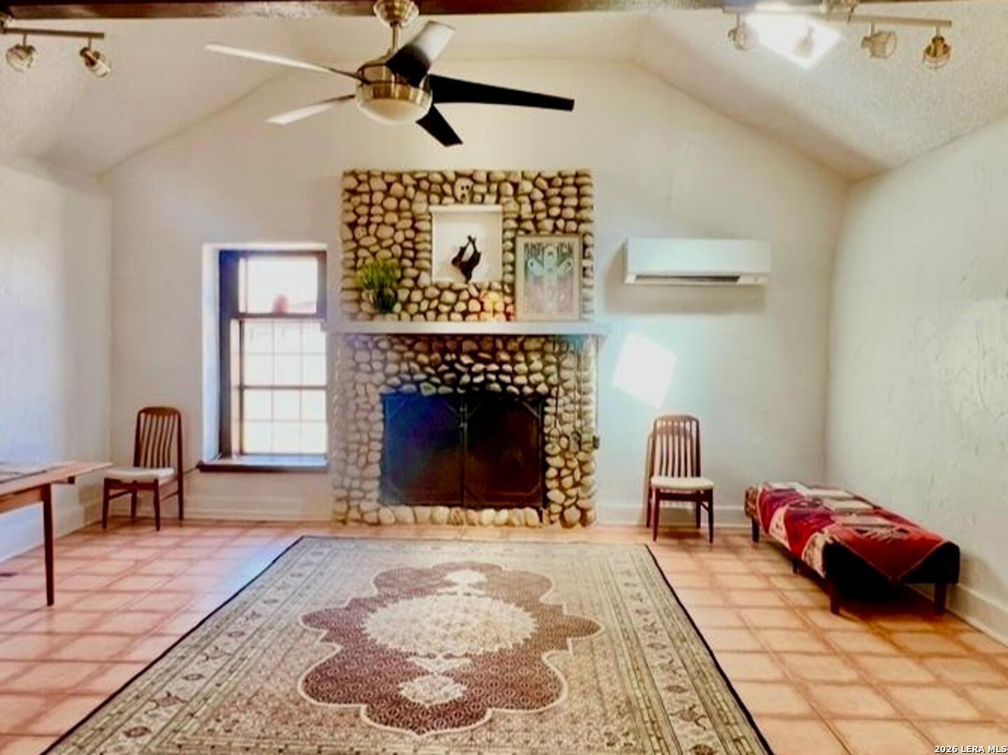299 Fort Clark Road Brackettville, TX 78832 - Photo 8 of 50 a bedroom with a bed and a fireplace