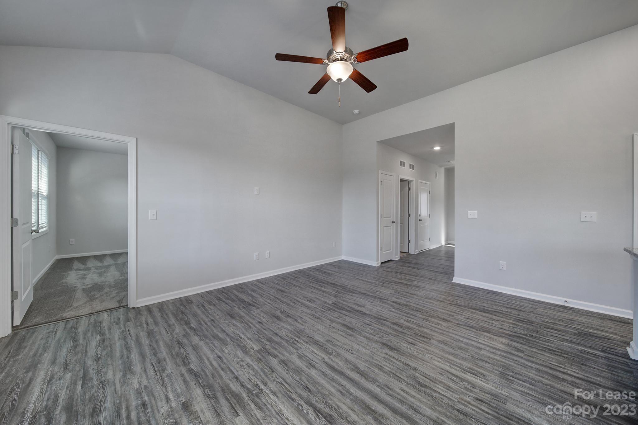 8201 Mccormick Street Terrell, NC 28682 - Photo 11 of 28 wooden floor in an empty room with a window
