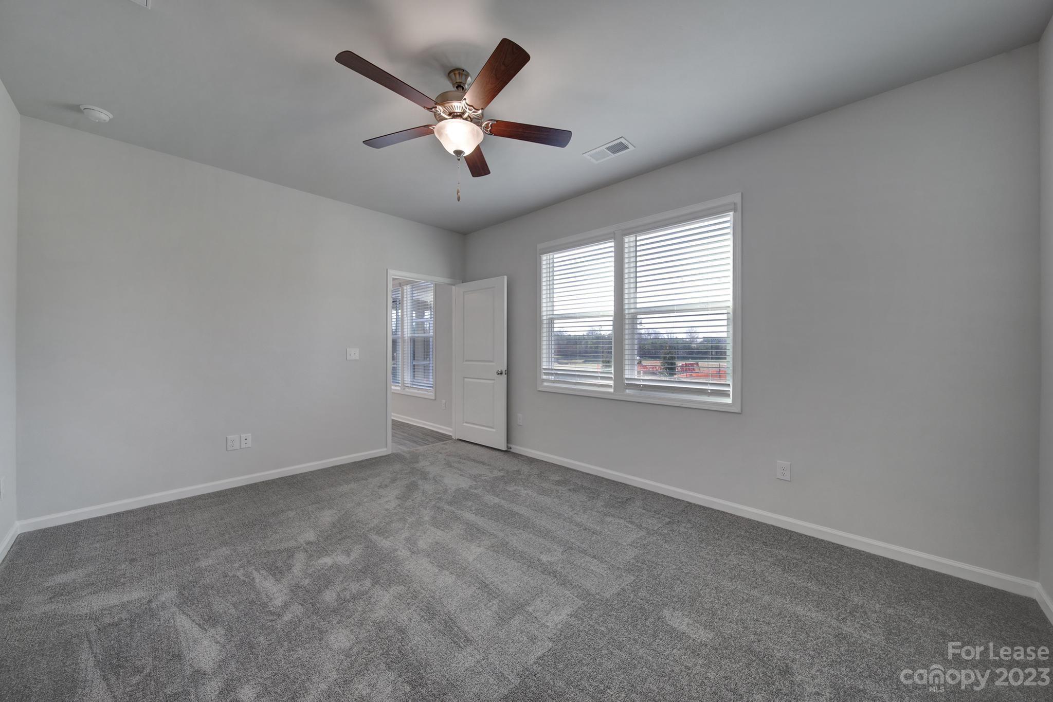 8201 Mccormick Street Terrell, NC 28682 - Photo 19 of 28 wooden floor in an empty room with a window
