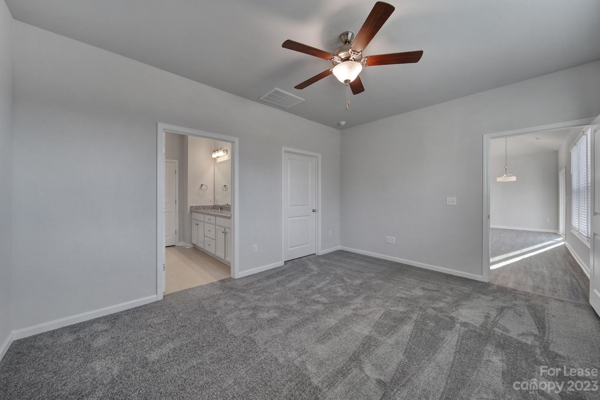 8201 Mccormick Street Terrell, NC 28682 - Photo 20 of 28 an empty room with fan and a ceiling fan