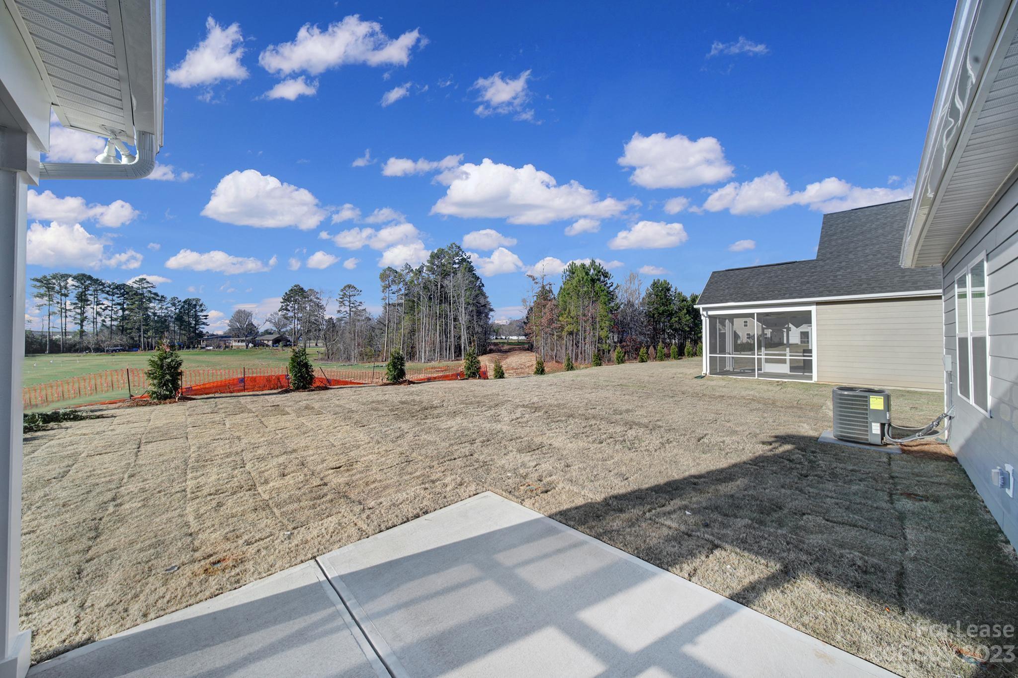 8201 Mccormick Street Terrell, NC 28682 - Photo 25 of 28 a view of a white house with a yard