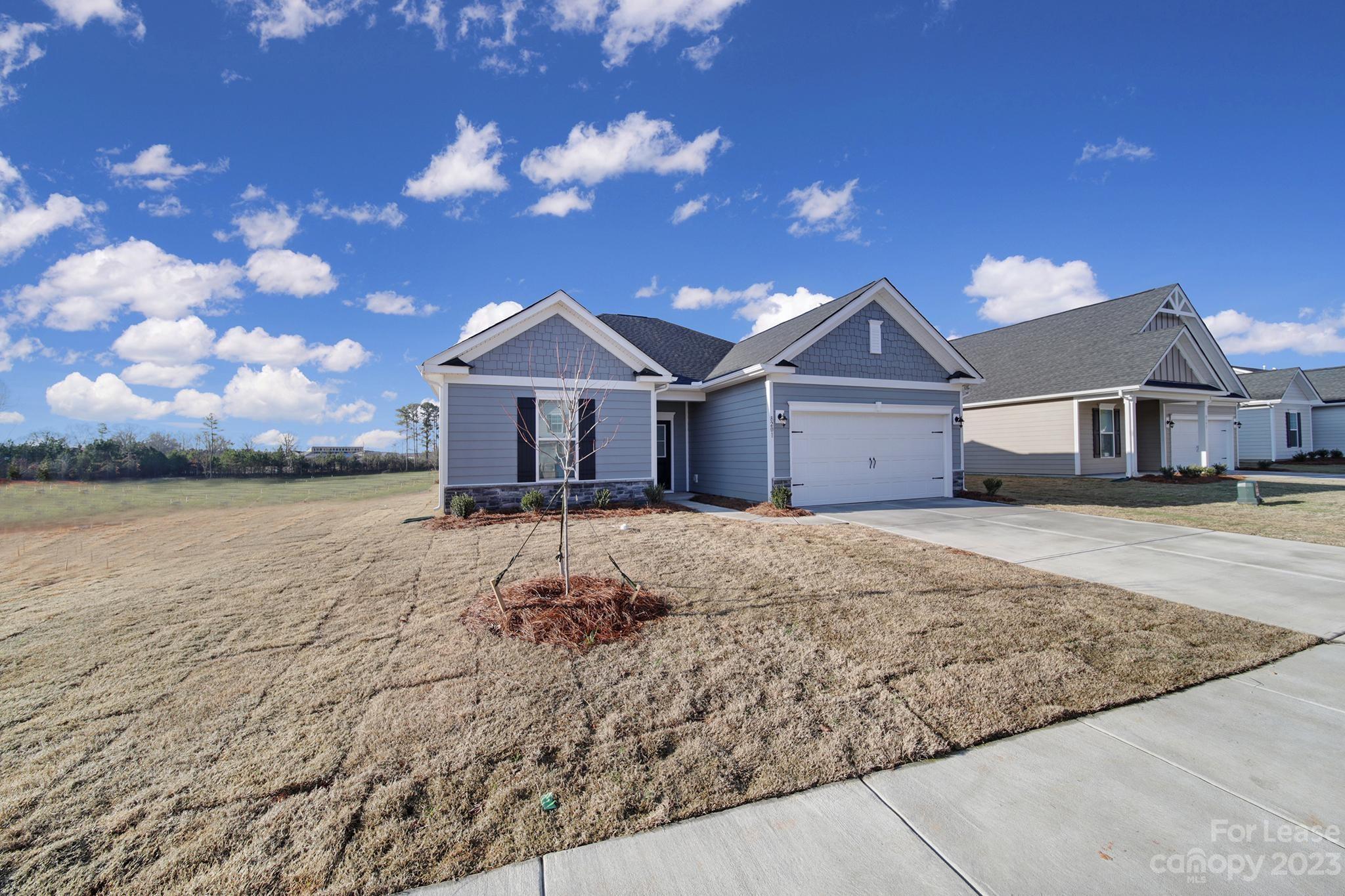 8201 Mccormick Street Terrell, NC 28682 - Photo 26 of 28 a front view of a house with a yard