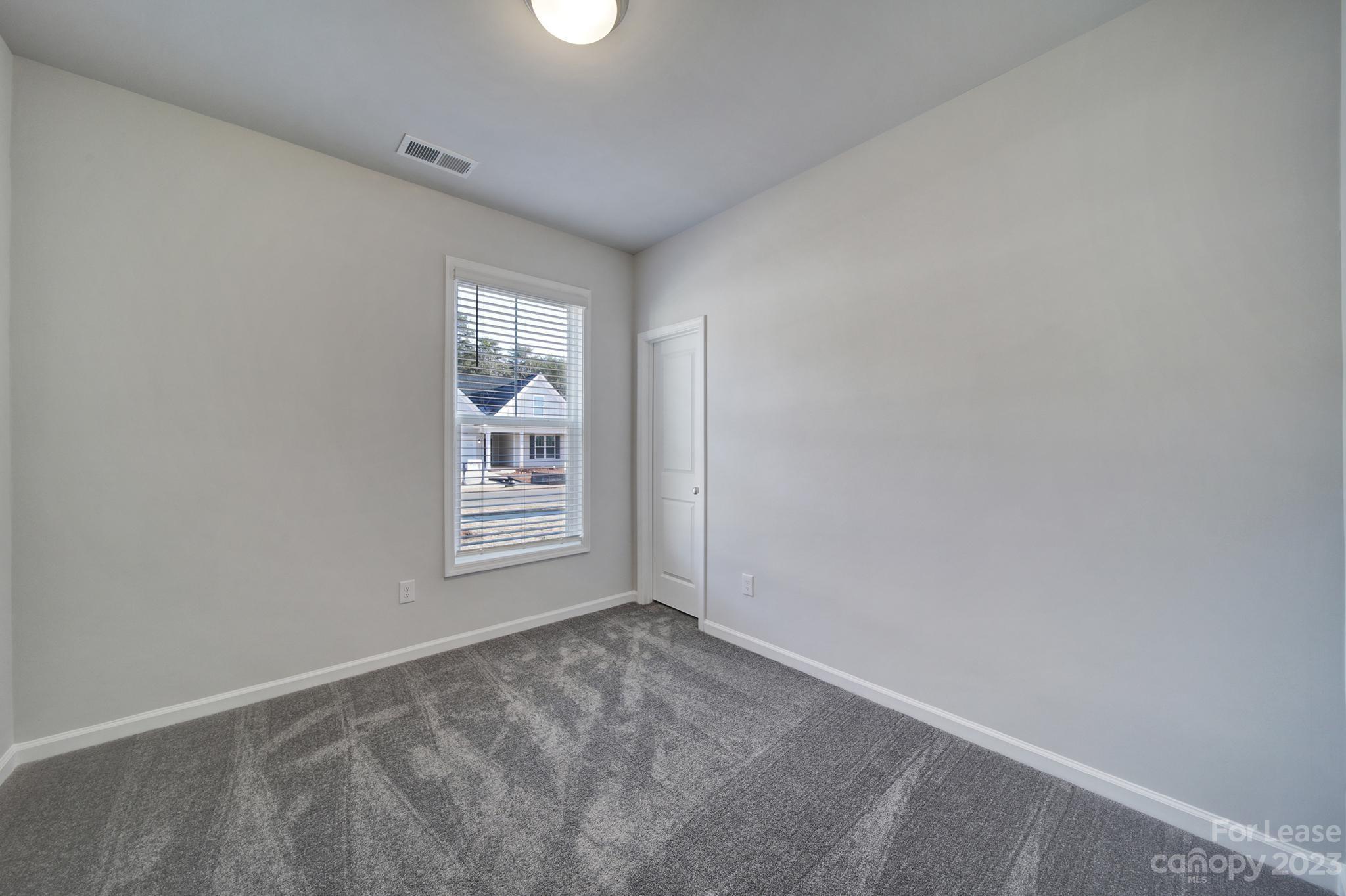 8201 Mccormick Street Terrell, NC 28682 - Photo 3 of 28 a view of an empty room with a window