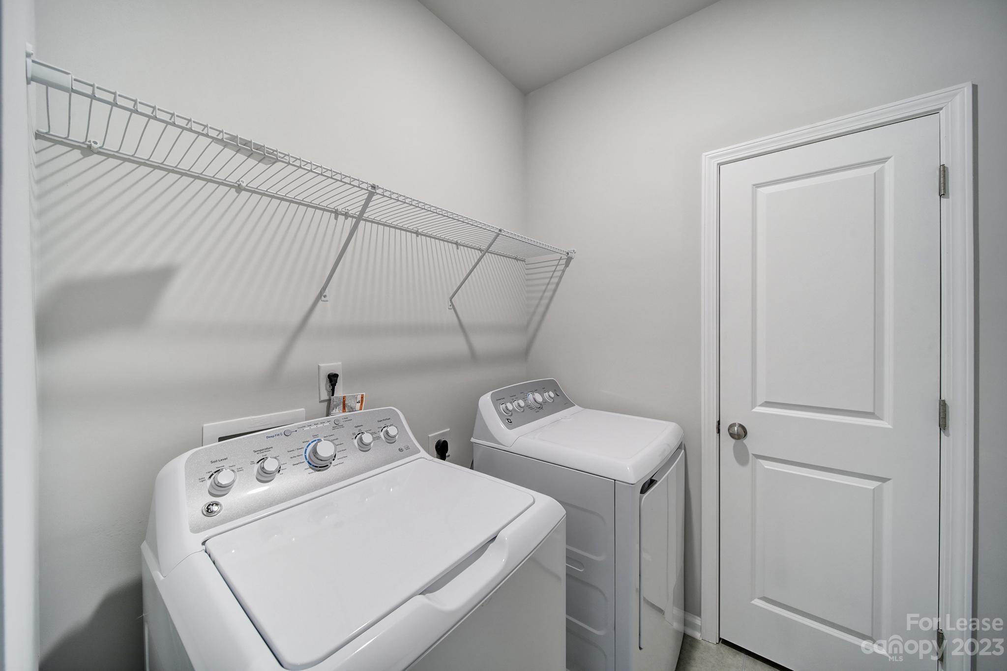 8201 Mccormick Street Terrell, NC 28682 - Photo 8 of 28 a utility room with dryer and washer