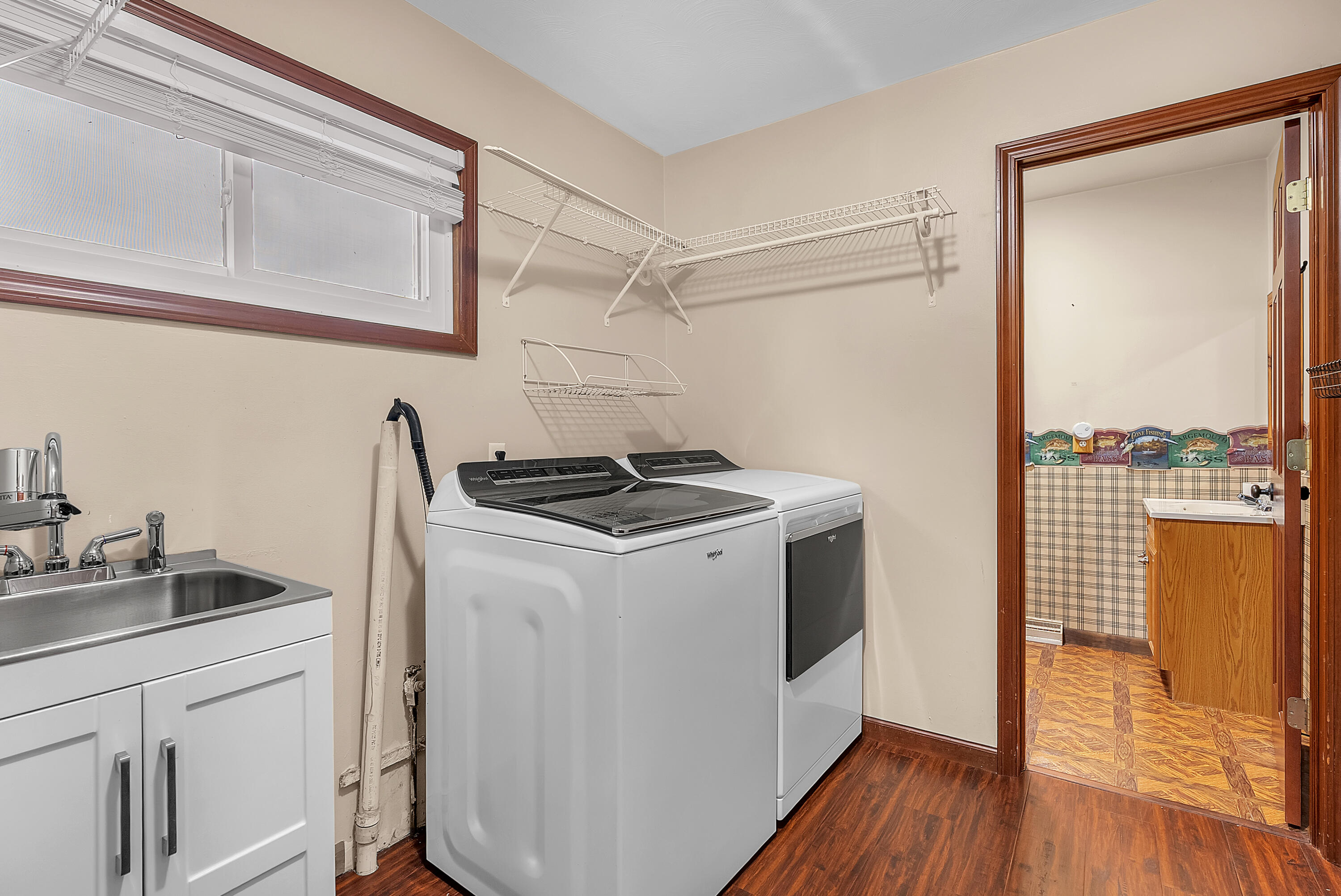 2204 South Meridian Road Morocco, IN 47963 - Photo 22 of 35 a kitchen with a stove and wooden floor