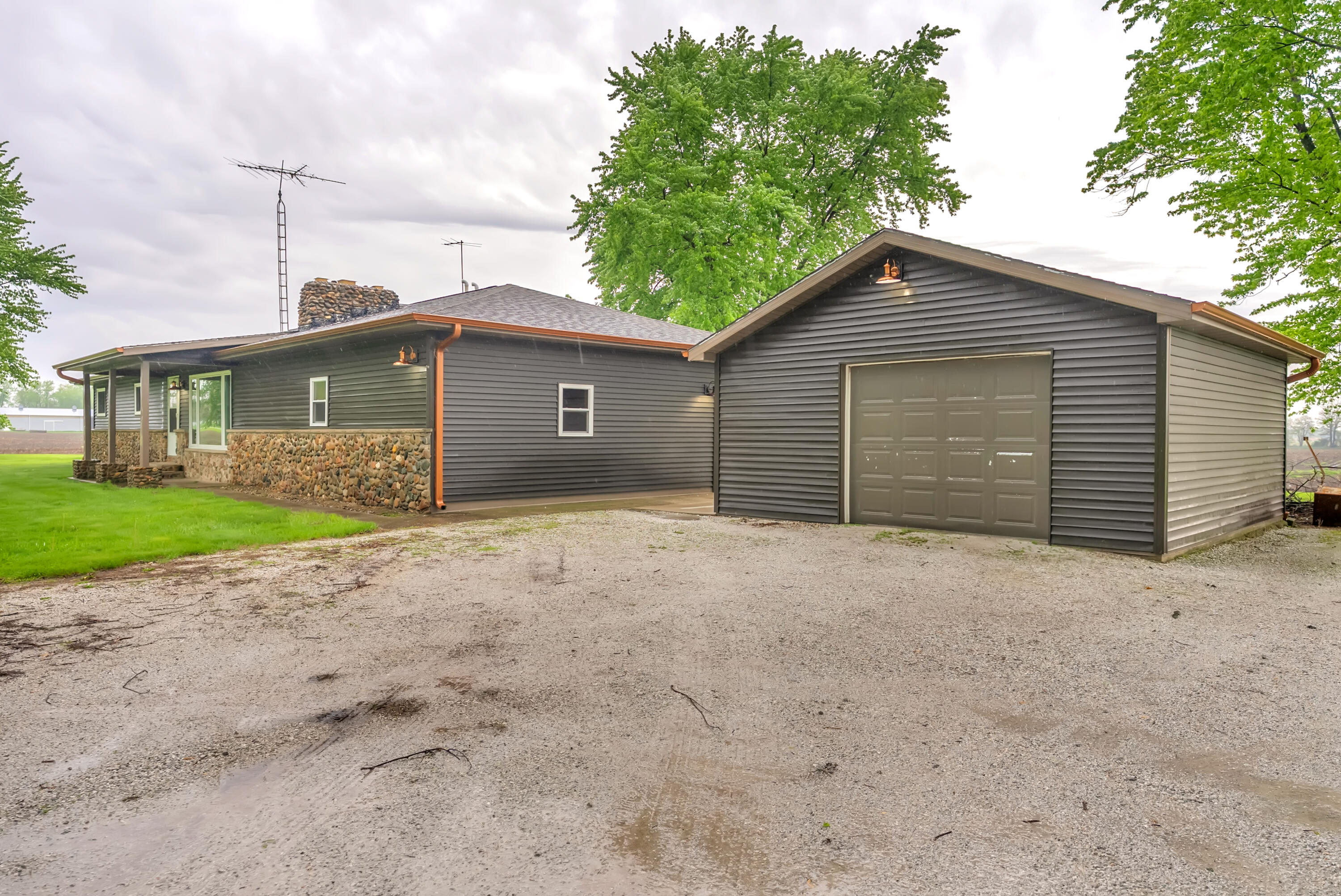 2204 South Meridian Road Morocco, IN 47963 - Photo 29 of 35 a view of a house with a yard and garage