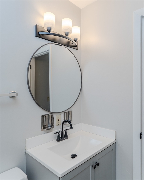 170 East Hadley Road, Unit 46 Amherst, MA 01002 - Photo 23 of 31 a bathroom with a sink and a mirror