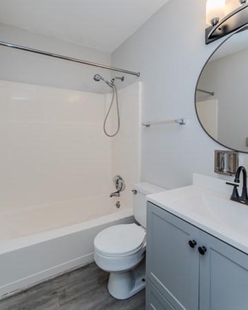170 East Hadley Road, Unit 46 Amherst, MA 01002 - Photo 24 of 31 a bathroom with a sink a toilet and a bathtub