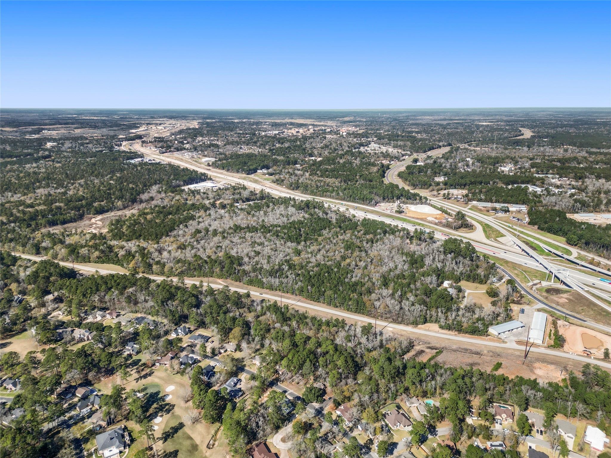 0 Interstate 45 South Huntsville, TX 77340 - Photo 9 of 13 an aerial view of city and mountain