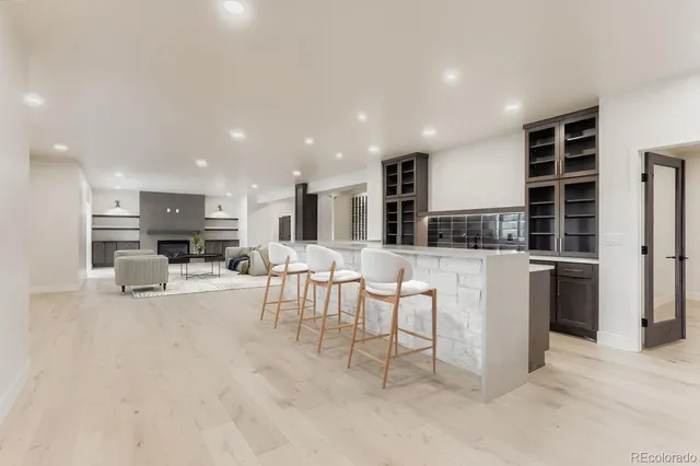 a view of a chairs and table in the patio