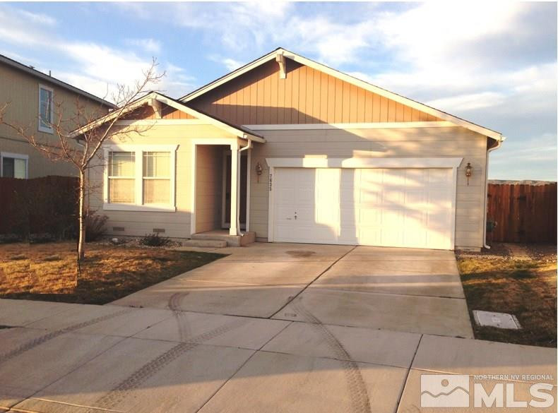 7635 Appenzell Street Reno, NV 89506 - Photo 1 of 1 a view of a house with a backyard