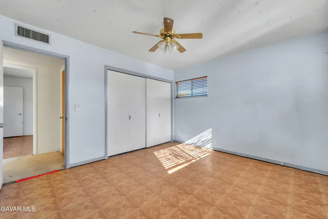 a view of room with ceiling fan