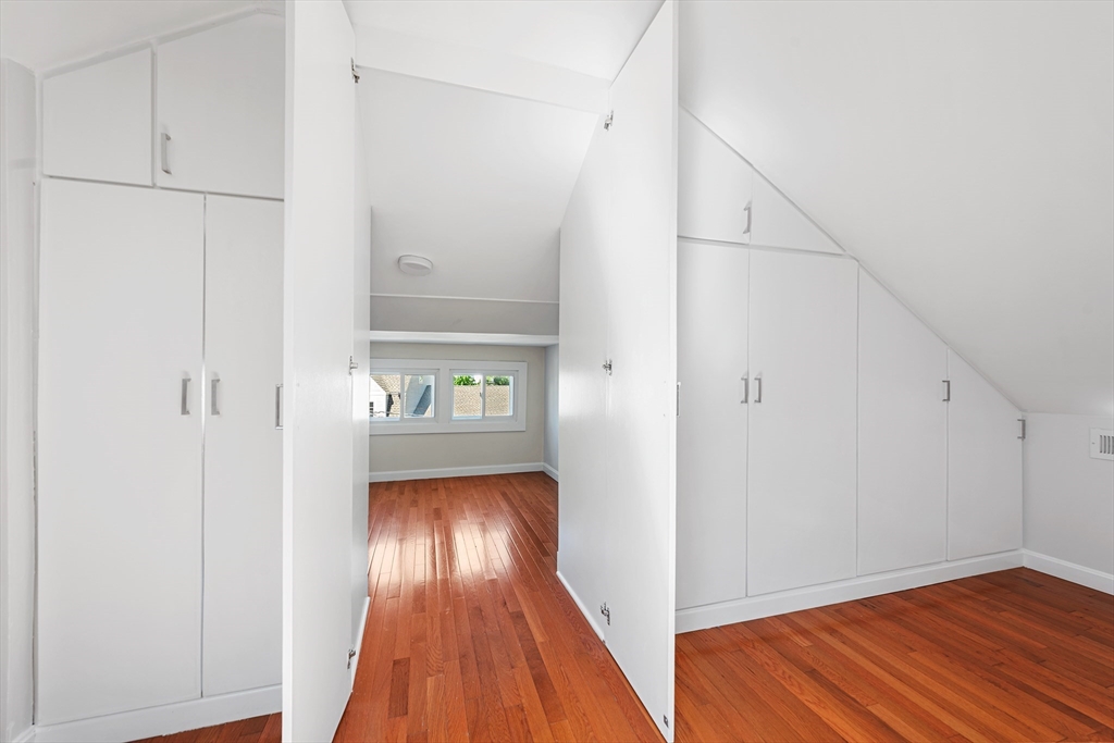 24 Jackson Road, Unit 2 Somerville, MA 02145 - Photo 28 of 35 a view of a hallway view with wooden floor
