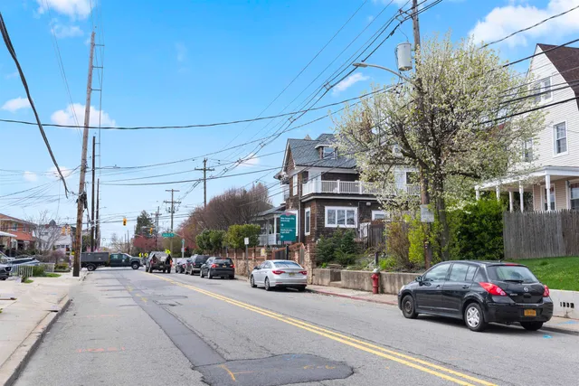 a bathroom with a sink toilet mirror and bathtub