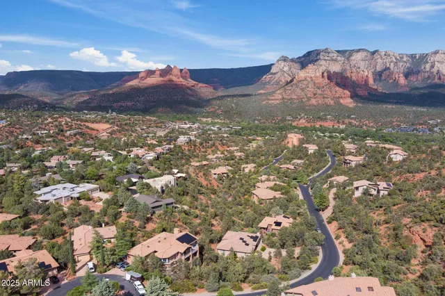 a view of a backyard of a house