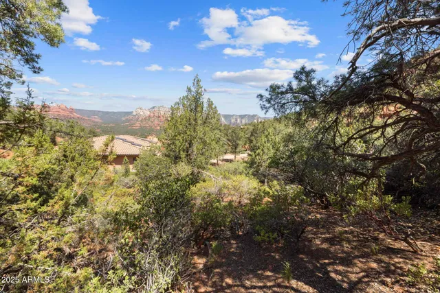 a view of houses with a pathway