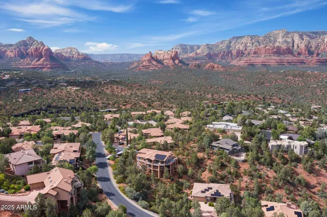 a view of a city with mountains in the background