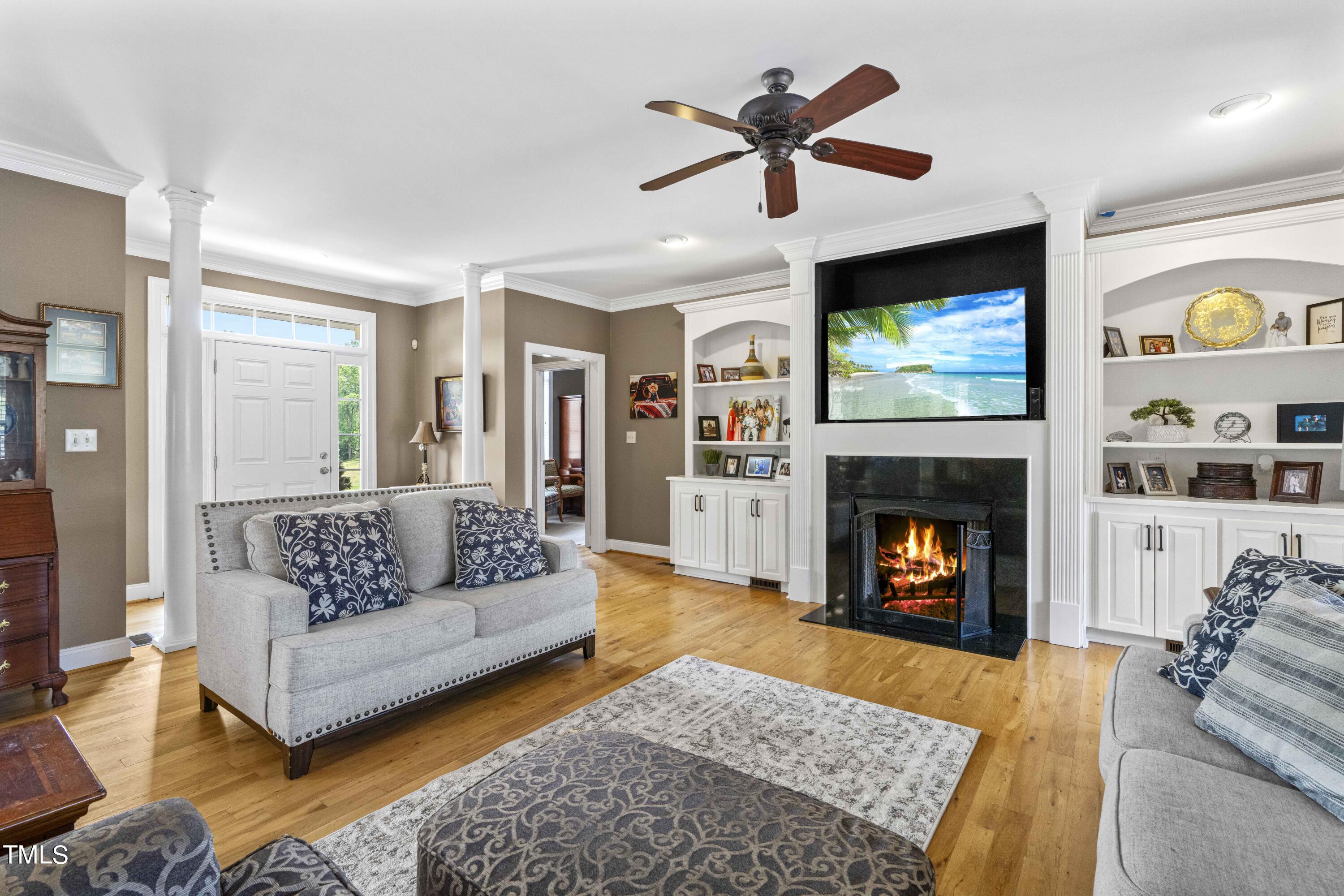 115 Three M Trail Benson, NC 27504 - Photo 14 of 80 a living room with furniture and a fireplace