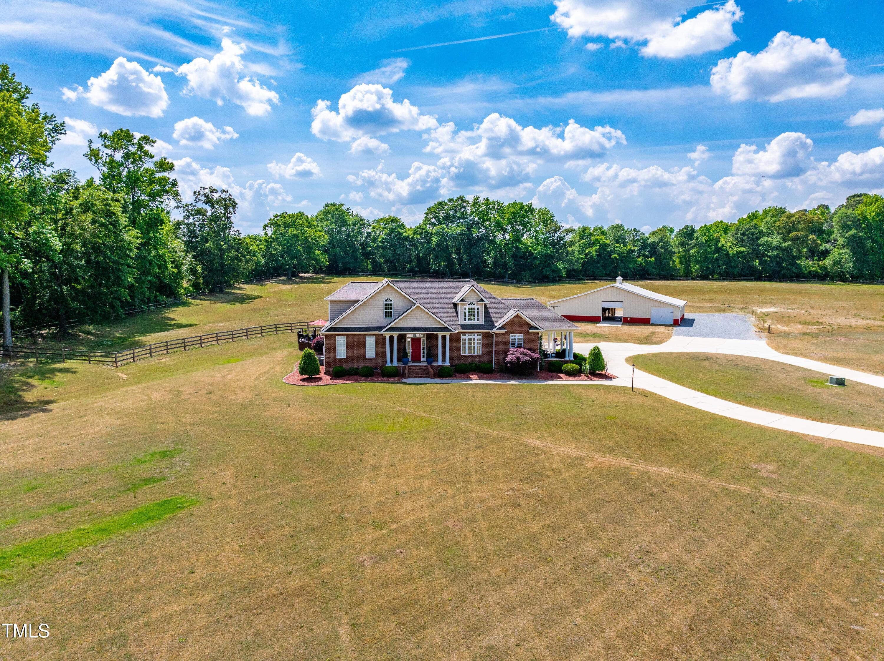 115 Three M Trail Benson, NC 27504 - Photo 59 of 80 a view of a swimming pool with an outdoor space and seating area