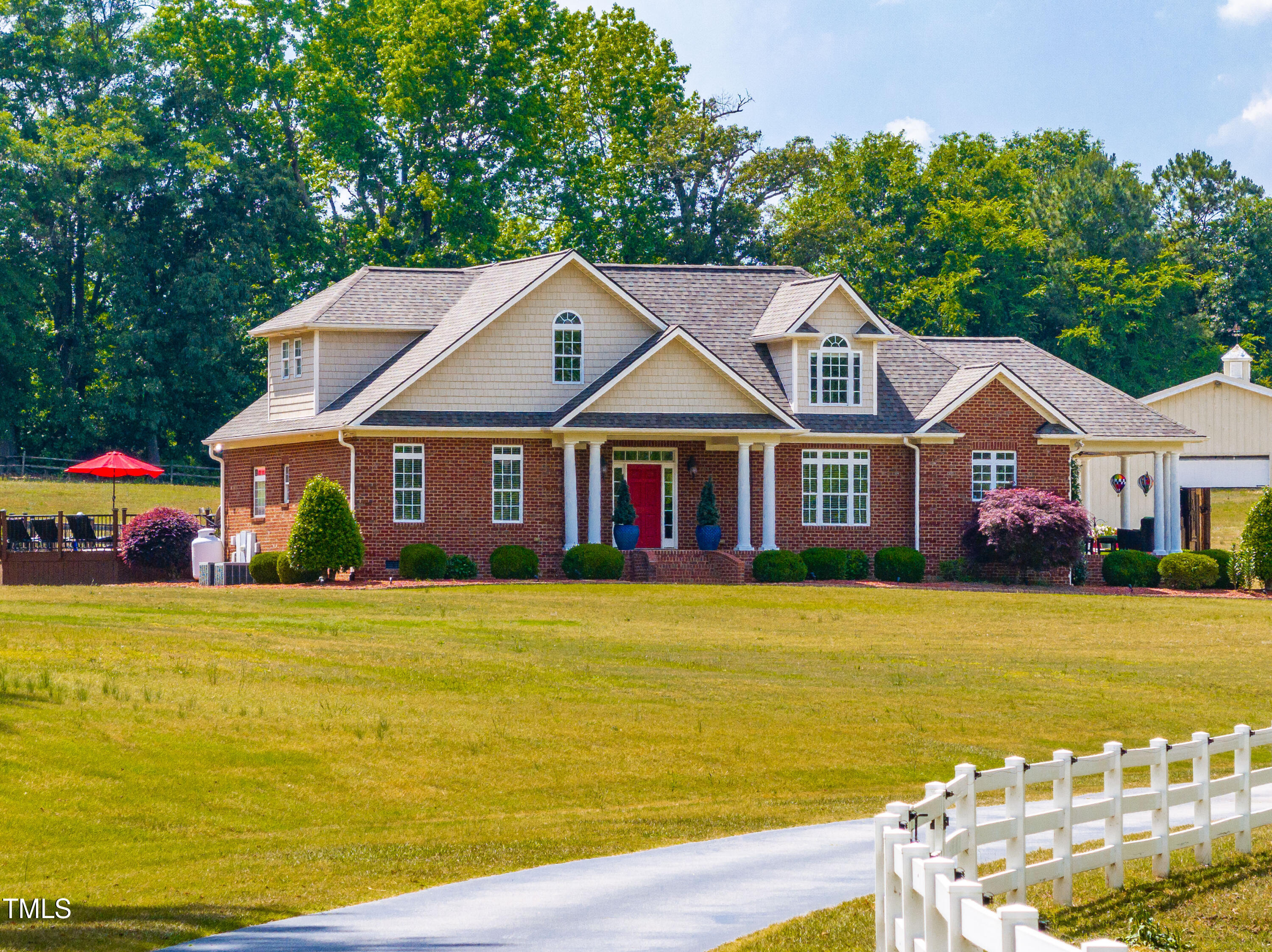 115 Three M Trail Benson, NC 27504 - Photo 61 of 80 a front view of a house with swimming pool