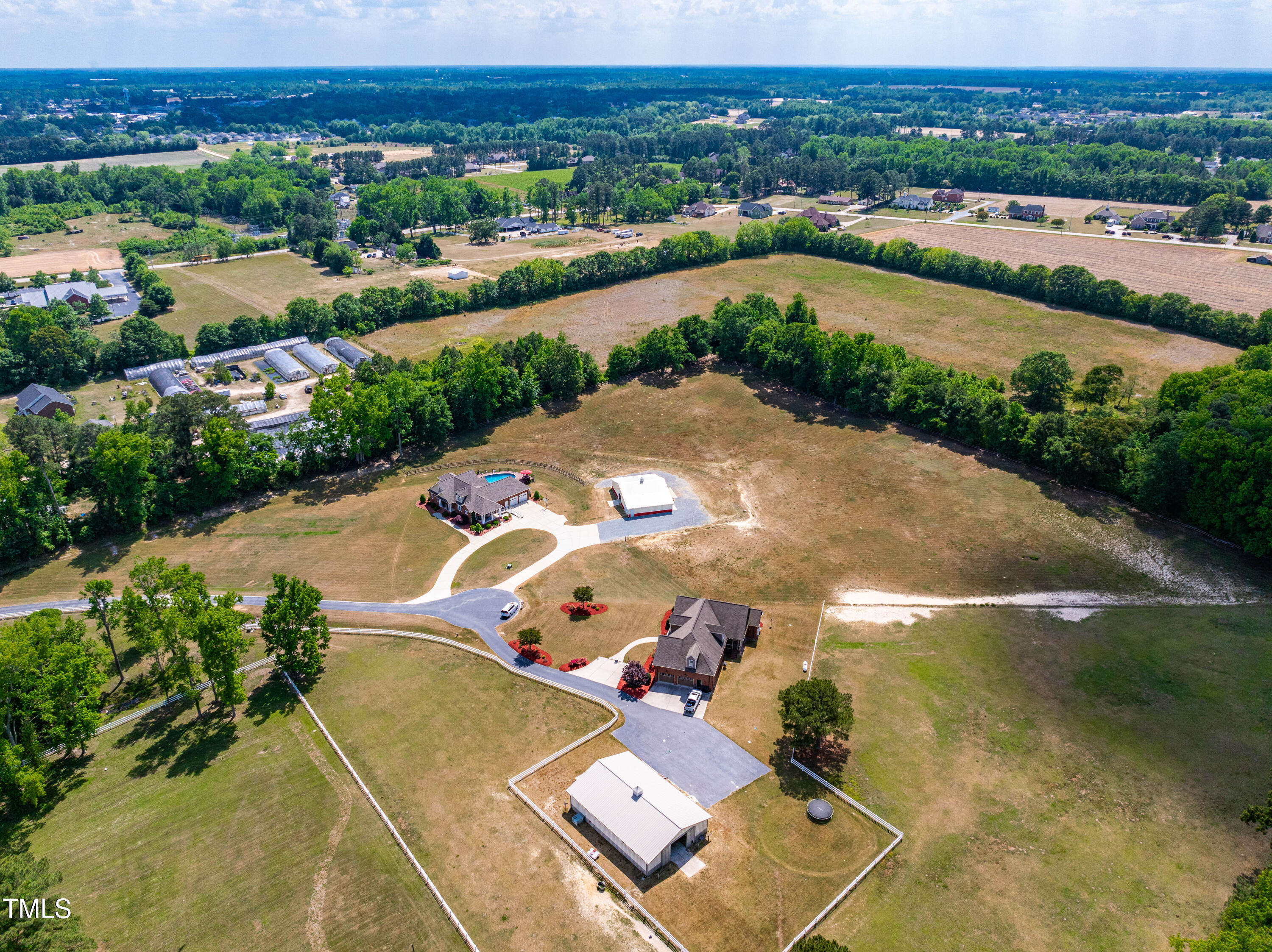115 Three M Trail Benson, NC 27504 - Photo 69 of 80 an aerial view of a house with a lake view