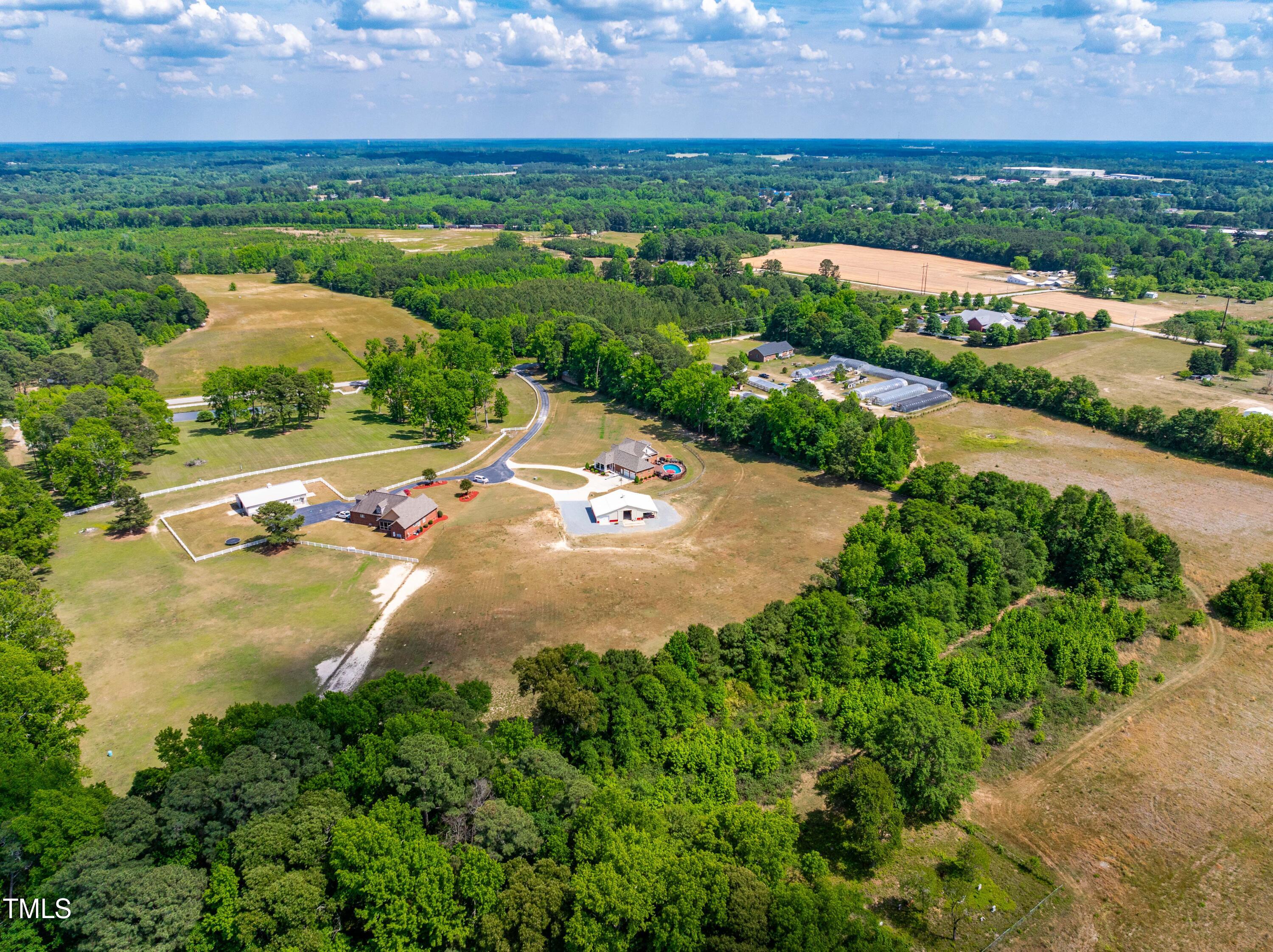 115 Three M Trail Benson, NC 27504 - Photo 71 of 80 an aerial view of residential houses with outdoor space and river