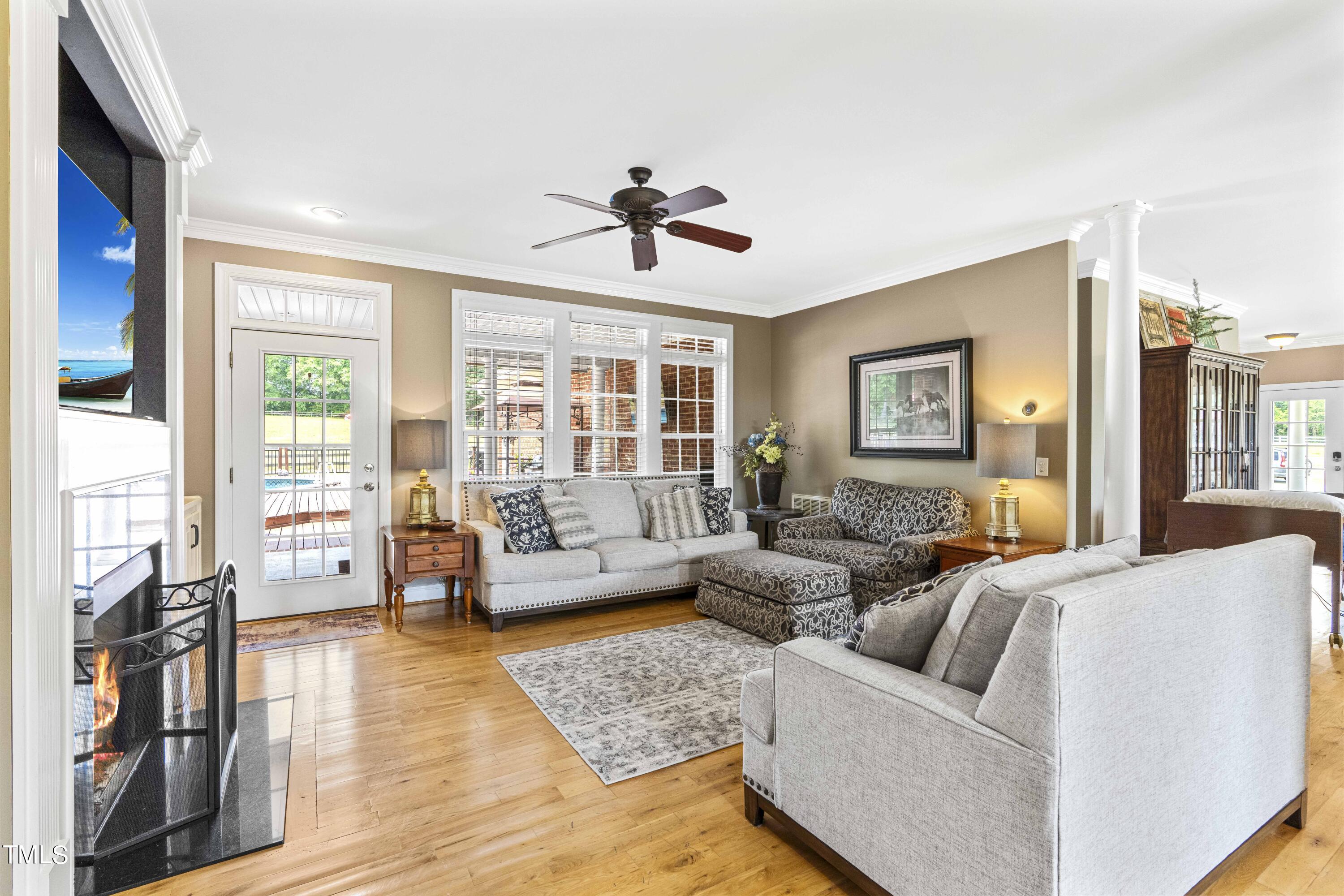 115 Three M Trail Benson, NC 27504 - Photo 10 of 80 a living room with furniture and a large window