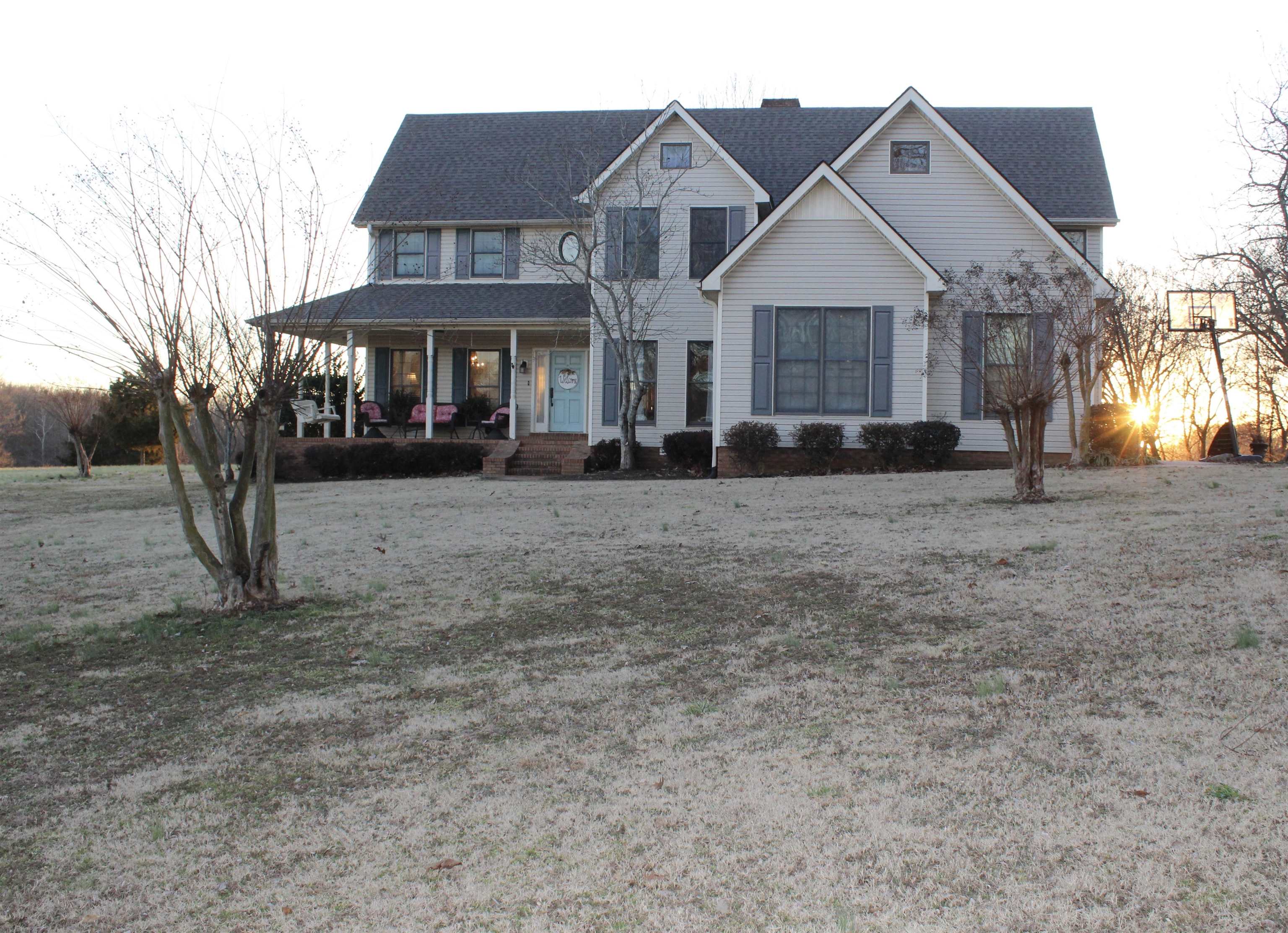 430 Belton Road Ripley, TN 38063 - Photo 1 of 25 a front view of a house with a yard
