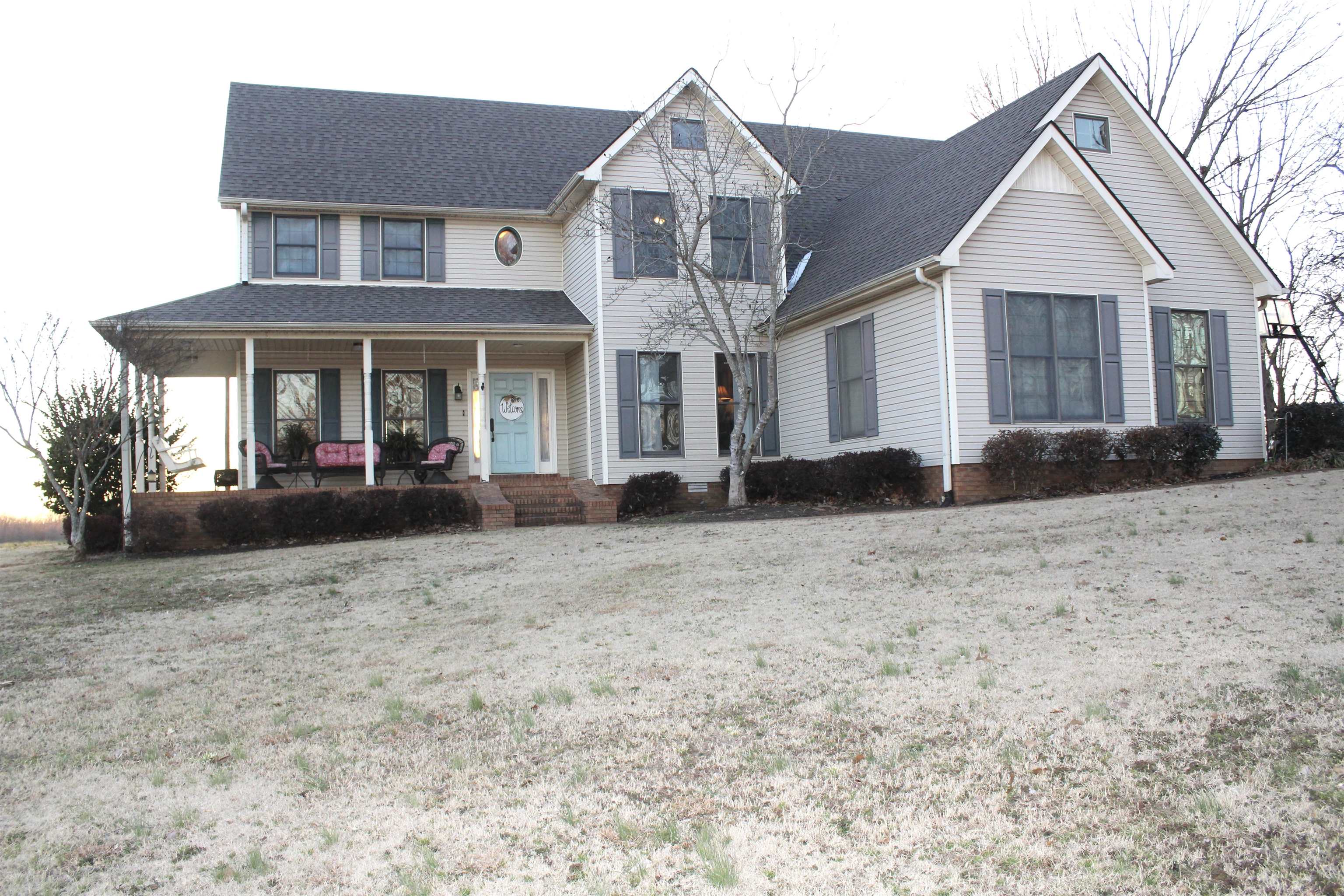 430 Belton Road Ripley, TN 38063 - Photo 2 of 25 a front view of a house with a yard