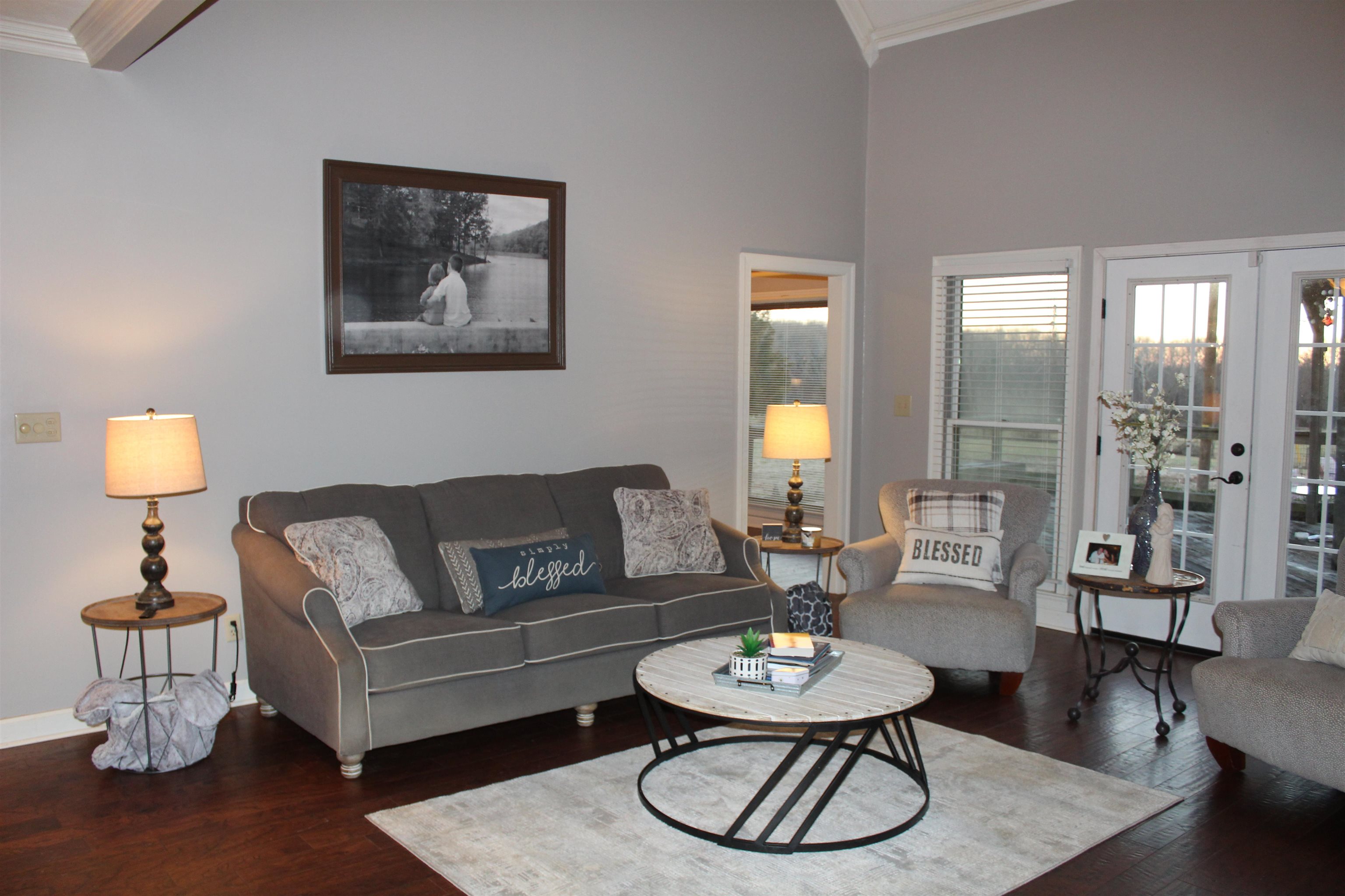 430 Belton Road Ripley, TN 38063 - Photo 5 of 25 a living room with furniture and a lamp