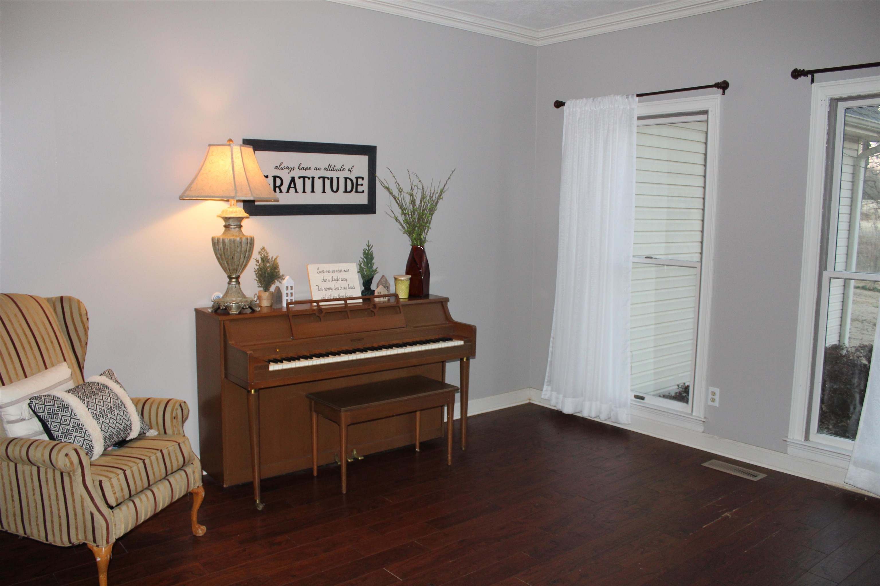 430 Belton Road Ripley, TN 38063 - Photo 9 of 25 a room with furniture and a wooden floor