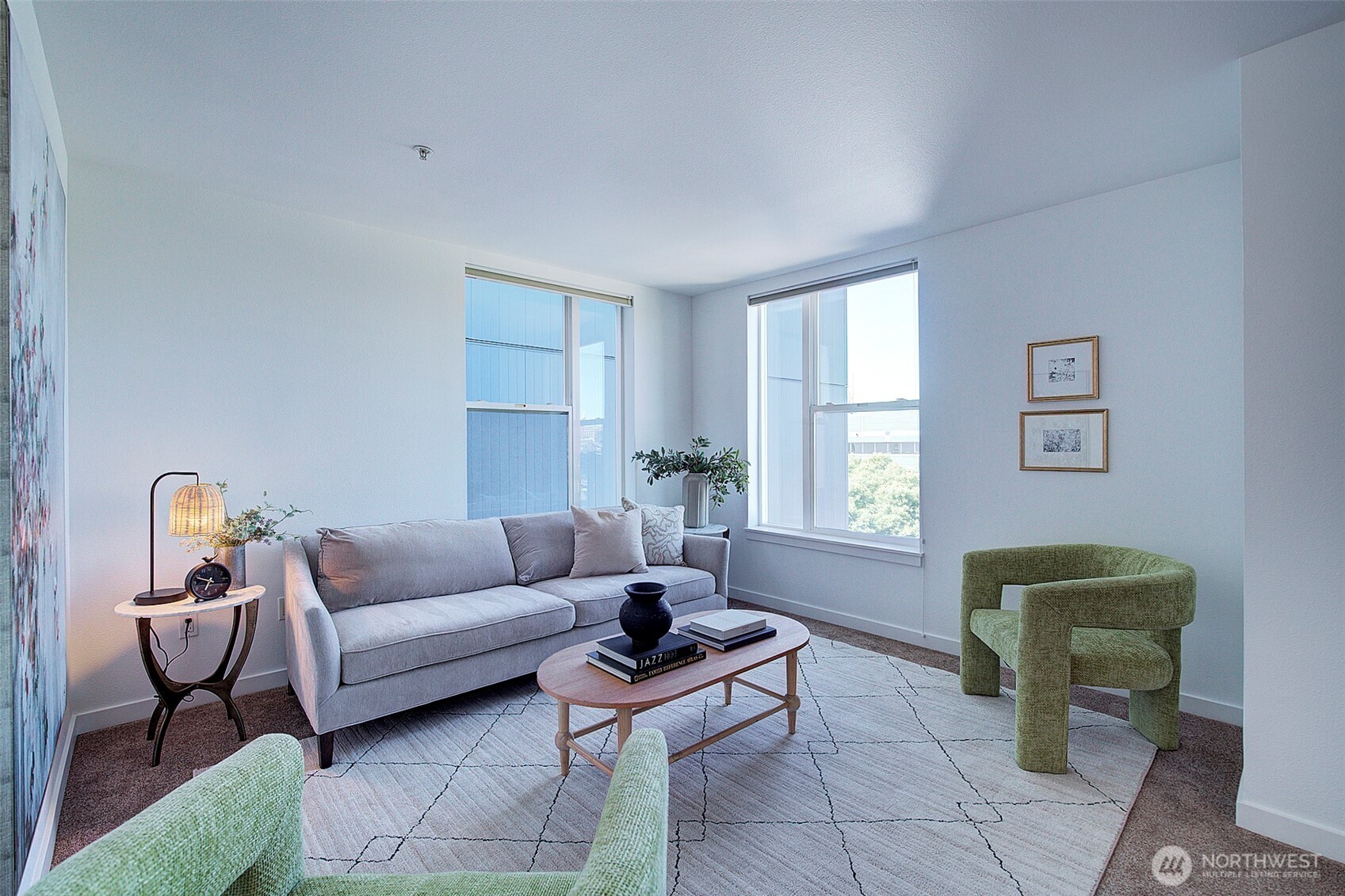 303 23rd Avenue South, Unit 506 Seattle, WA 98144 - Photo 6 of 36 a living room with furniture and a window